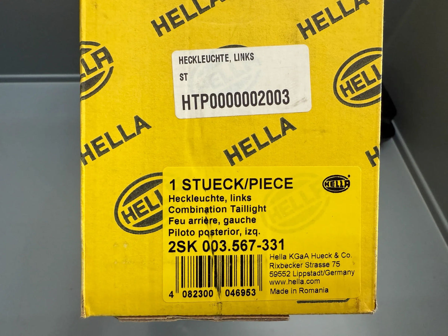 Original Hella Heckleuchte Links 2SK 003 567-331 NEU