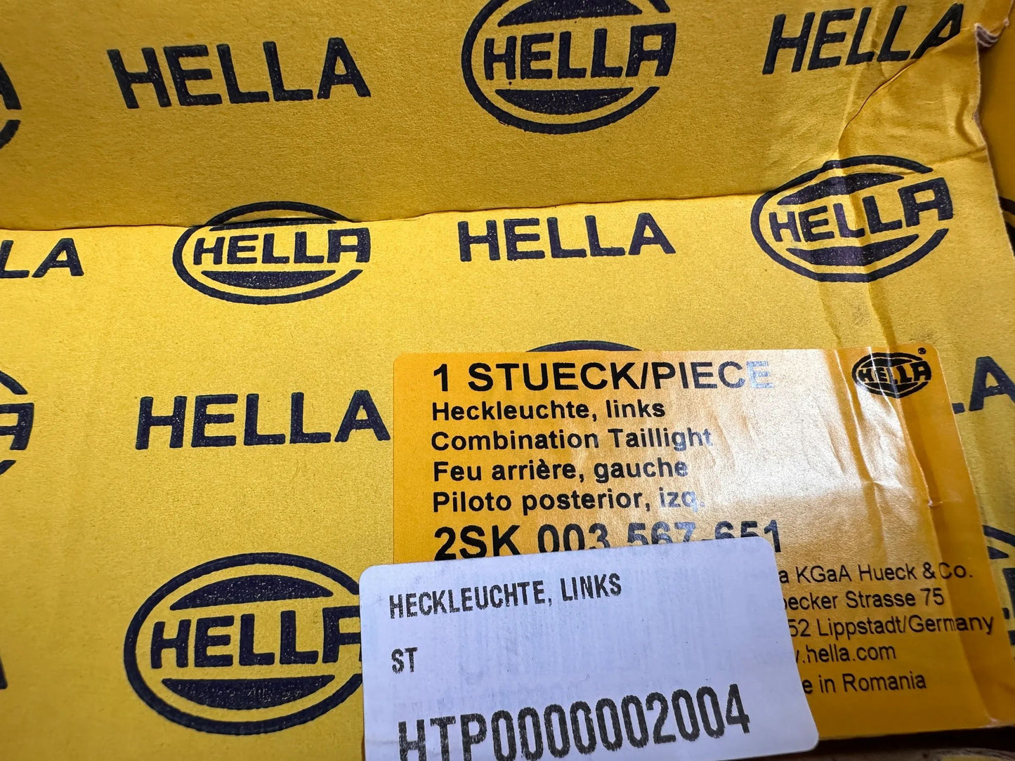 Original Hella Heckleuchte Links 2SK 003 567-651 NEU