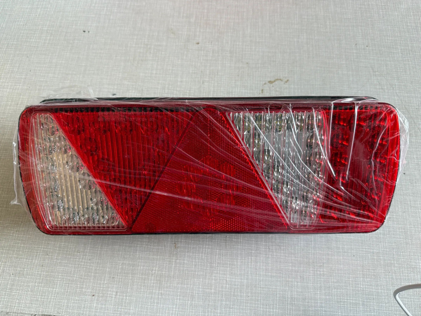 Original Herth+Buss Fahrzeugteile GmbH & Co. KG Heckleuchte links 83830174 NEU
