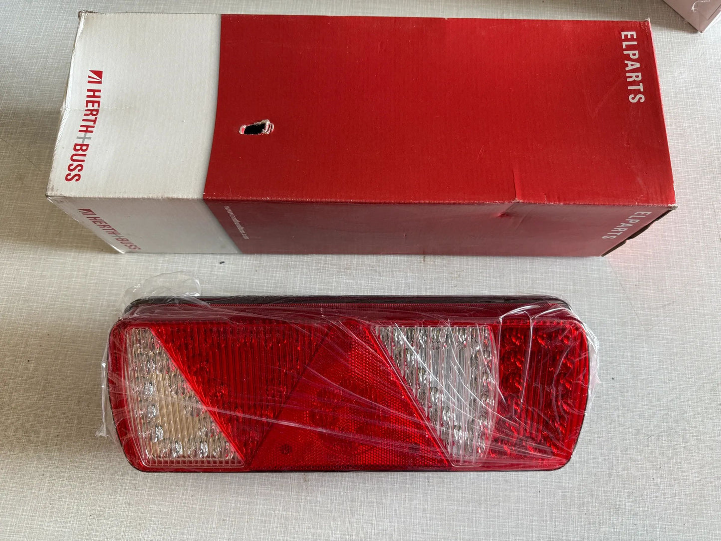 Original Herth+Buss Fahrzeugteile GmbH & Co. KG Heckleuchte links 83830174 NEU